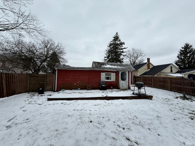 view of snow covered house