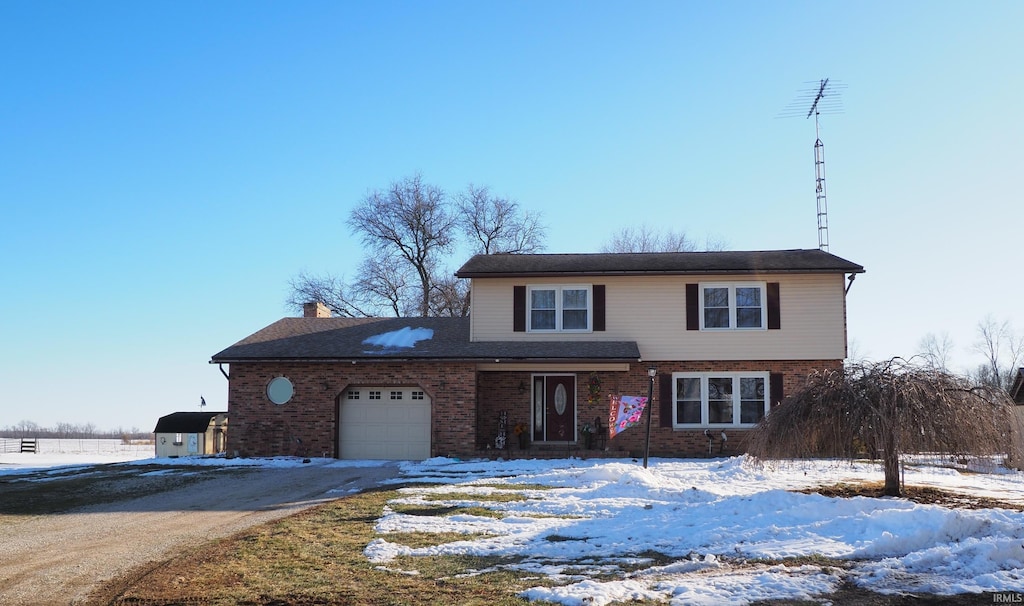 front of property featuring a garage