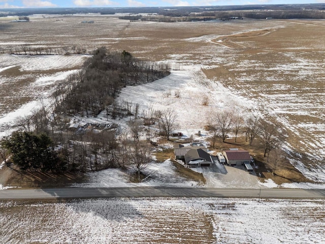 snowy aerial view with a rural view