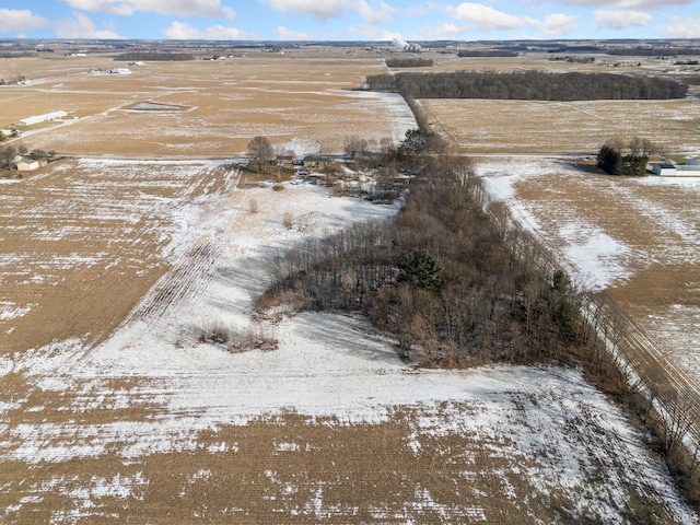 snowy aerial view with a rural view