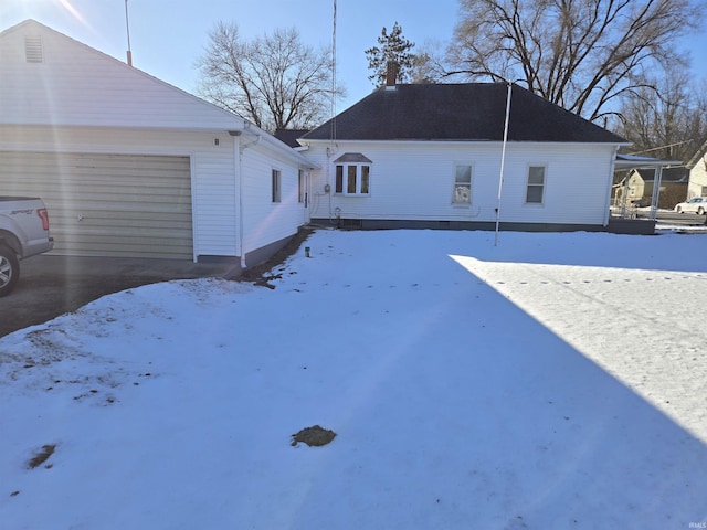 view of snow covered property