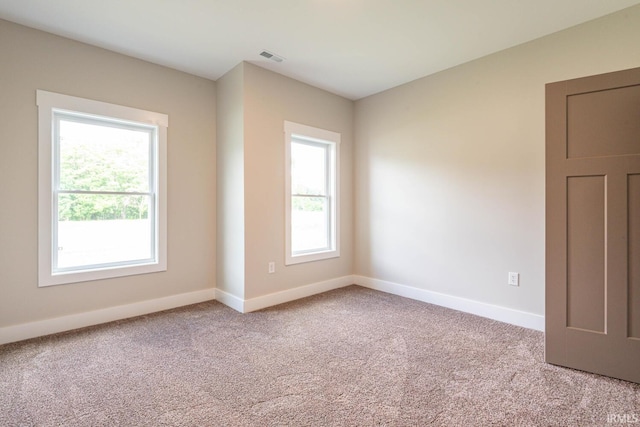 view of carpeted spare room