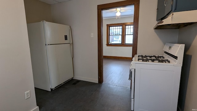 kitchen featuring ceiling fan and white appliances