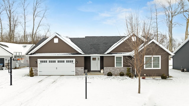 craftsman house with a garage