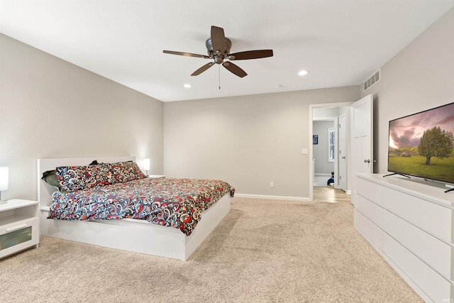 carpeted bedroom featuring ceiling fan