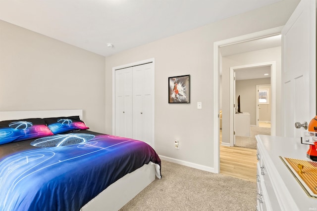 carpeted bedroom with a closet