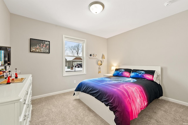 bedroom featuring light colored carpet