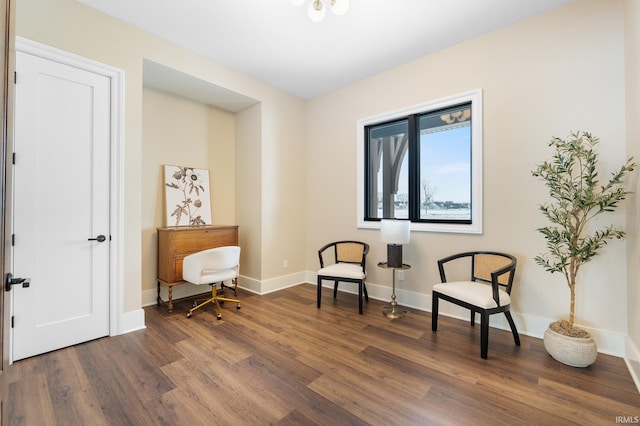 sitting room with dark hardwood / wood-style floors