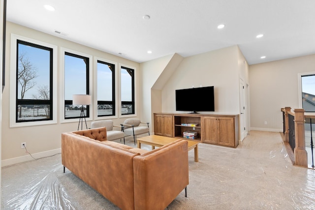 living room featuring a wealth of natural light