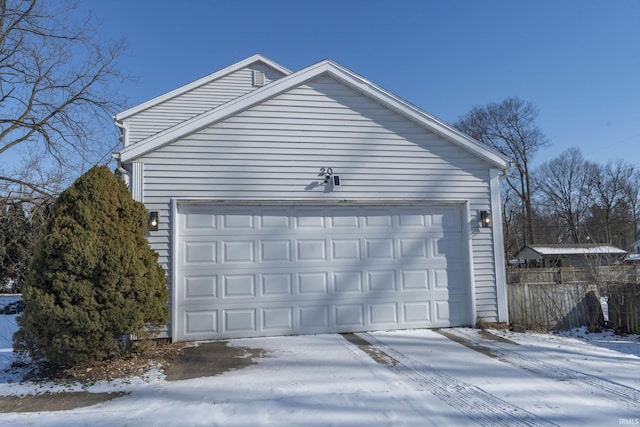 view of snow covered garage