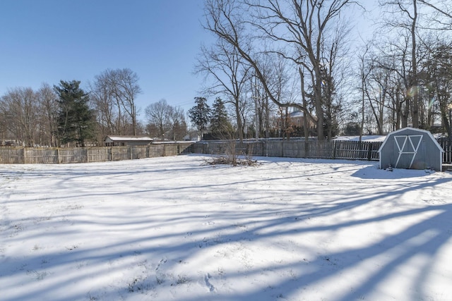 view of yard covered in snow