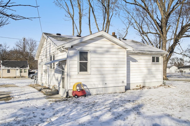 view of snow covered property