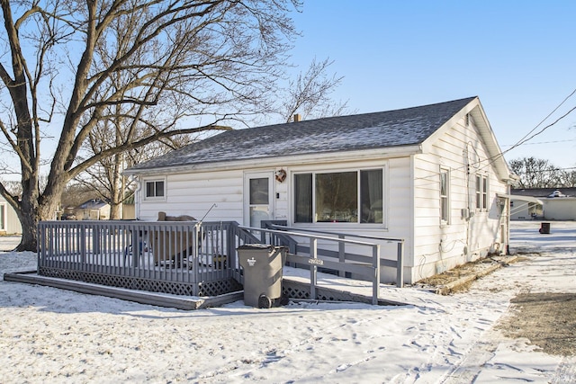 view of front of home with a wooden deck