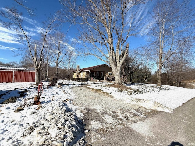 view of snowy yard