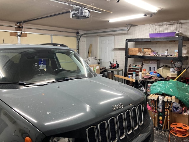 garage featuring a garage door opener