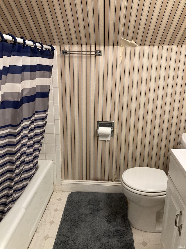 bathroom featuring wood ceiling, toilet, and shower / bath combination with curtain