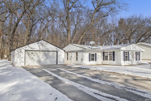 ranch-style house featuring a garage