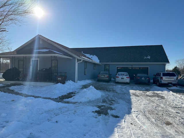 single story home with a garage