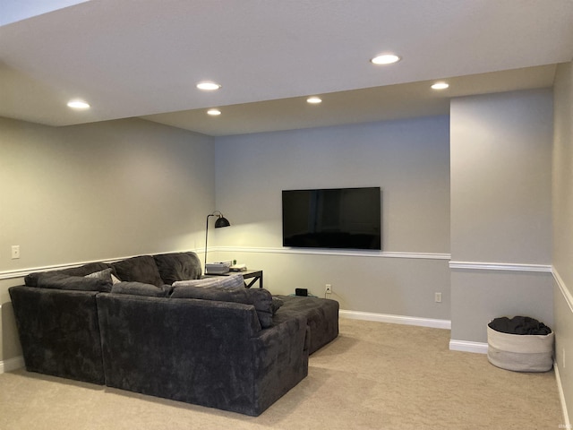 living area featuring recessed lighting, baseboards, and carpet floors