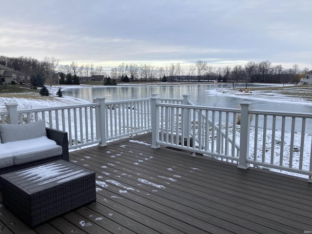 wooden terrace with a water view