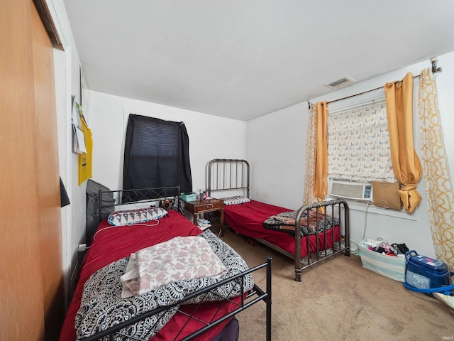 bedroom with carpet floors and cooling unit