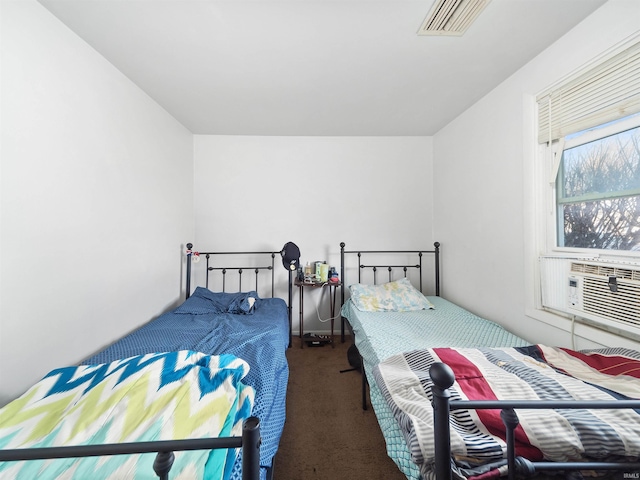 carpeted bedroom with cooling unit