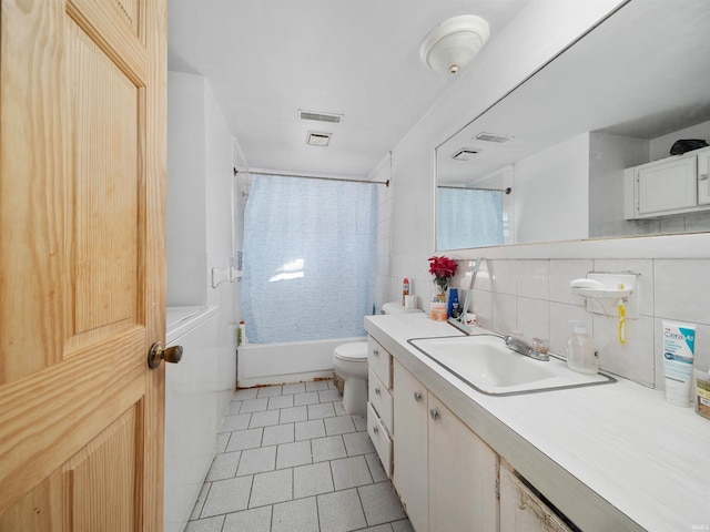 full bathroom with tile walls, backsplash, toilet, shower / bath combination with curtain, and vanity