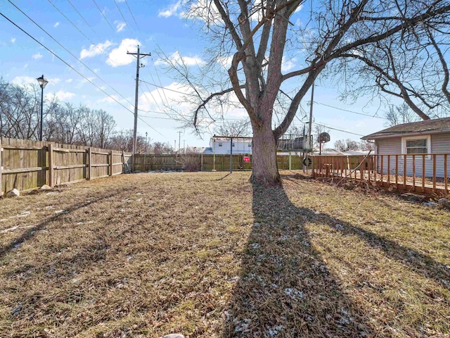 view of yard with a wooden deck