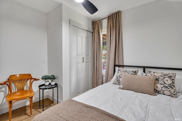 bedroom featuring a closet, ceiling fan, and hardwood / wood-style floors