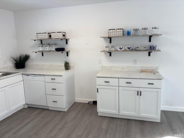 bar featuring white cabinets, dark wood-type flooring, and dishwasher