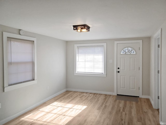 entrance foyer featuring light hardwood / wood-style floors