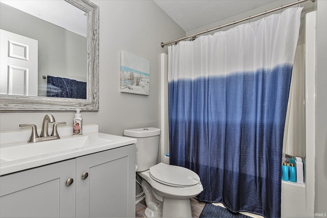 full bathroom with a textured ceiling, toilet, vanity, and shower / bath combination with curtain