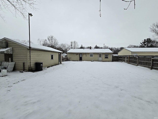 view of snow covered house