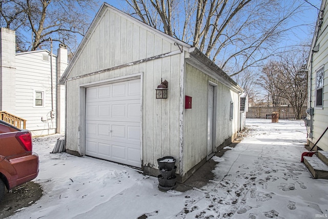 view of snow covered garage