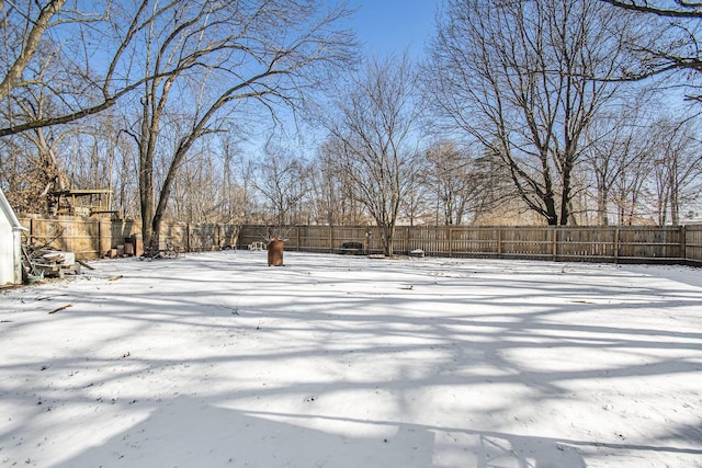 view of yard covered in snow