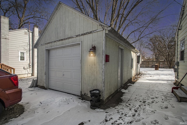 view of snow covered garage