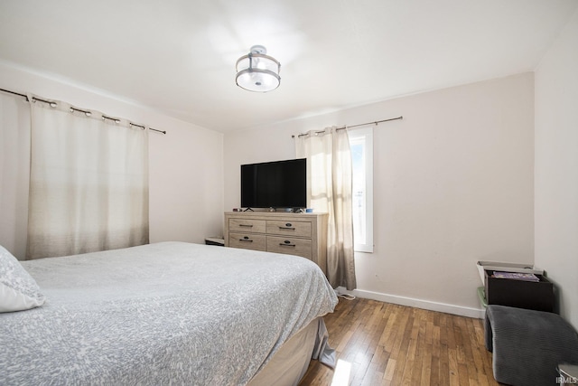 bedroom featuring hardwood / wood-style floors