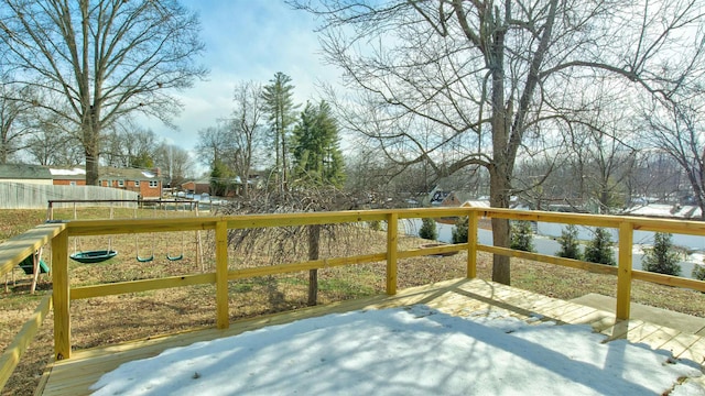 wooden terrace with a water view