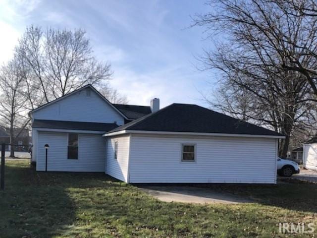 view of property exterior featuring a yard