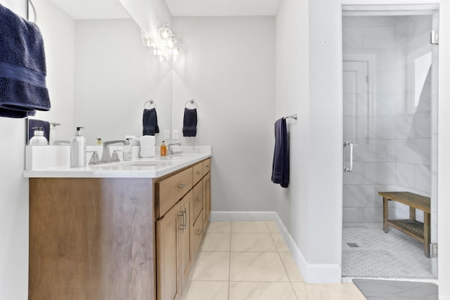 bathroom featuring tile patterned flooring, walk in shower, and vanity