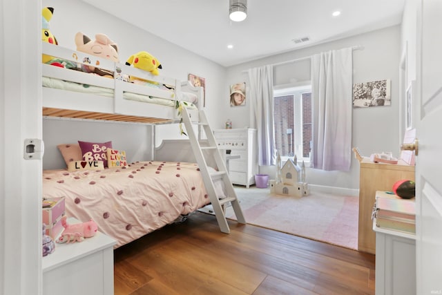 bedroom featuring wood-type flooring