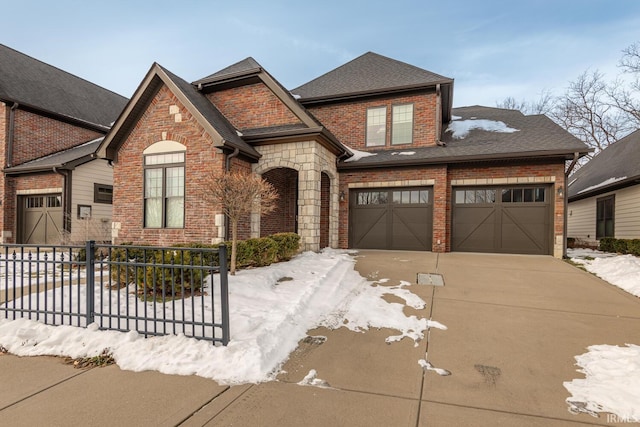 view of front of property featuring a garage