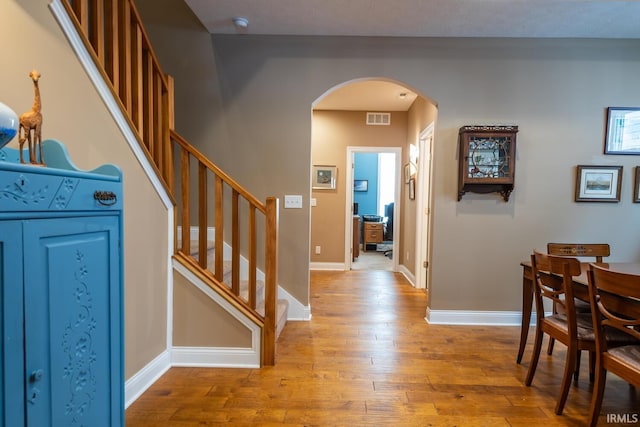 entryway with light hardwood / wood-style floors