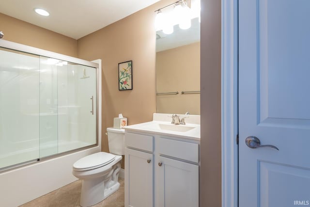 full bathroom featuring vanity, toilet, enclosed tub / shower combo, and tile patterned flooring