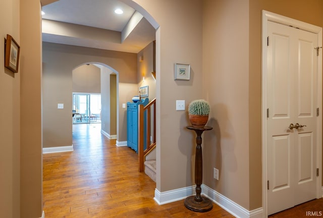 corridor featuring light hardwood / wood-style floors