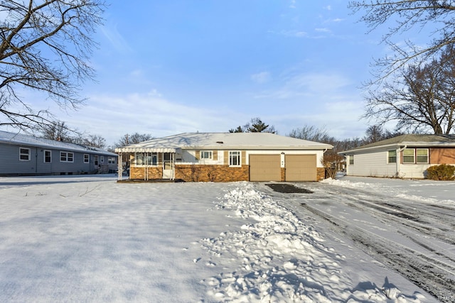 single story home with a garage