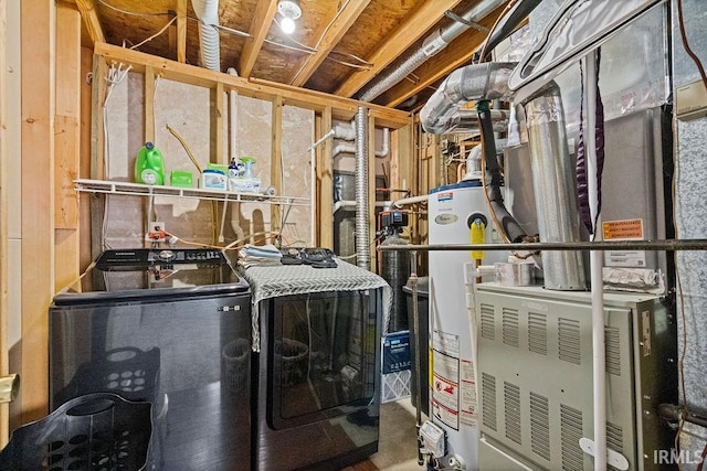 washroom with heating unit, washing machine and clothes dryer, and water heater