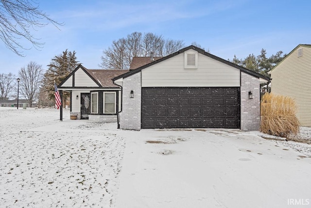 view of front of home with a garage