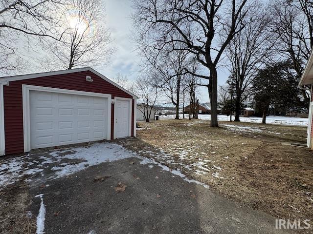 view of snow covered garage