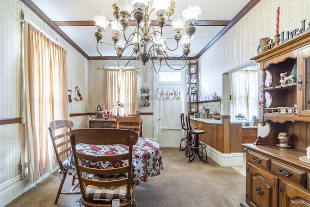 dining room with crown molding, light carpet, and a notable chandelier